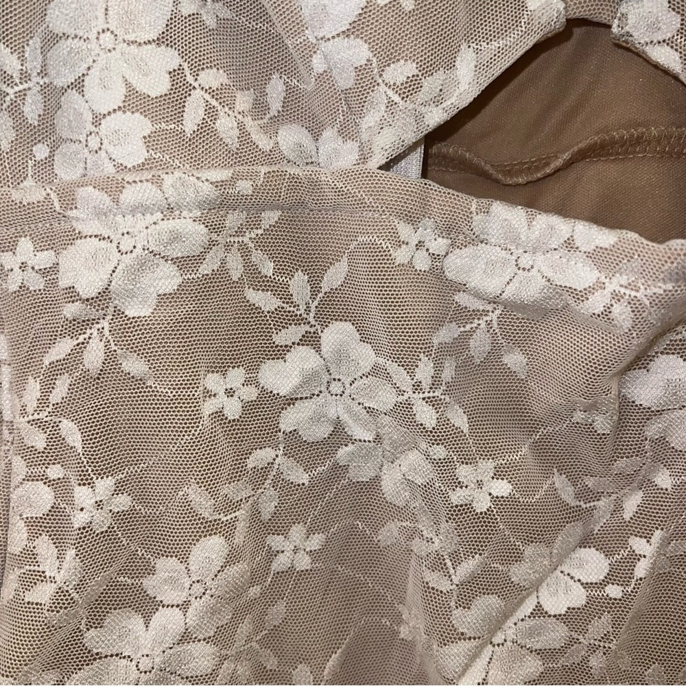 So Sunny Ivory Lace Cutout Short Sleeve
Bodysuit - Picture 12 of 12